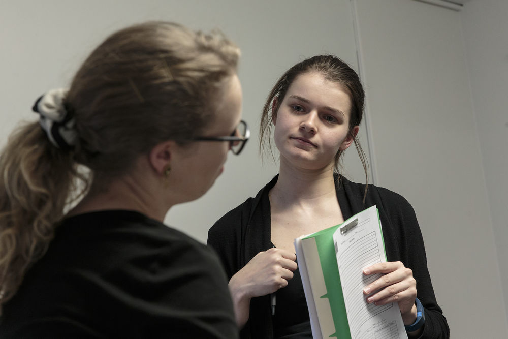 a woman conducting a consultation.