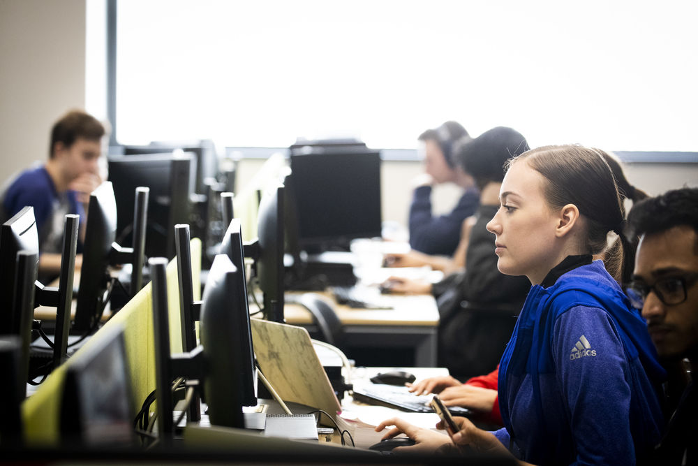 students working on desktop computers. 