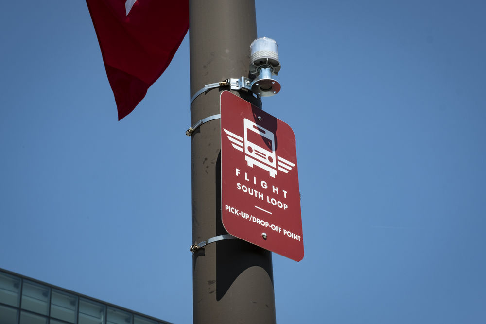 one of the FLIGHT shuttle stop signs on Main Campus.